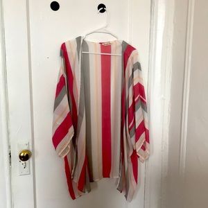 Cute multi colored polyester light cover up for sale!